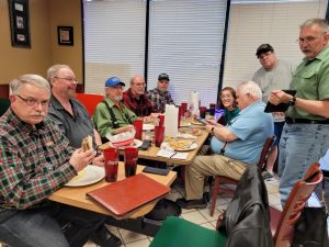 March Hamfest planning meeting, held at Sam & Joe’s Pizza & Subs Left to right Wayne N7QLK, Ken KN4DD, Ron K3FR, John KG4NXT, Gill KM4OZH, Lori KC0EWN, Don WA2SWX, Wayne W4HCR, Tony KM4KLB and not seen Theresa KG4TVM (taking photo).