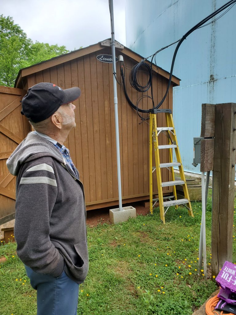 Al KB4BHB watches work with our repeater shack in the background