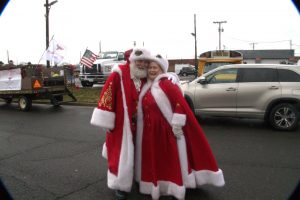 Mr. & Mrs. Claus in the parade route
