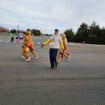 Duane KK4BZ runs with HT along side 3 turkey girls